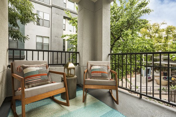 Outdoor patio with modern seating at City Place Apartments: luxury living with Greystar