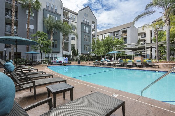 Olympic-sized pool with cabanas at City Place Apartments