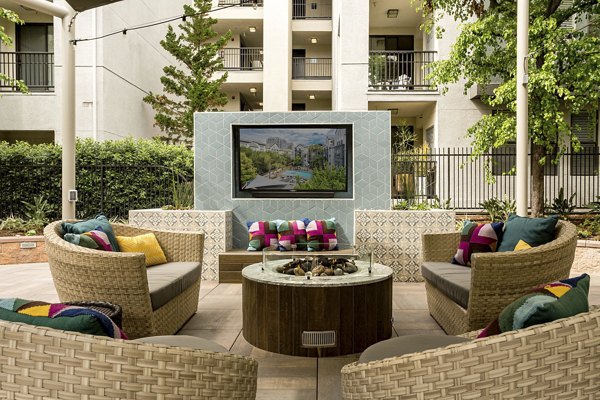 Cozy fire pit seating area at City Place Apartments offering outdoor relaxation and entertainment space