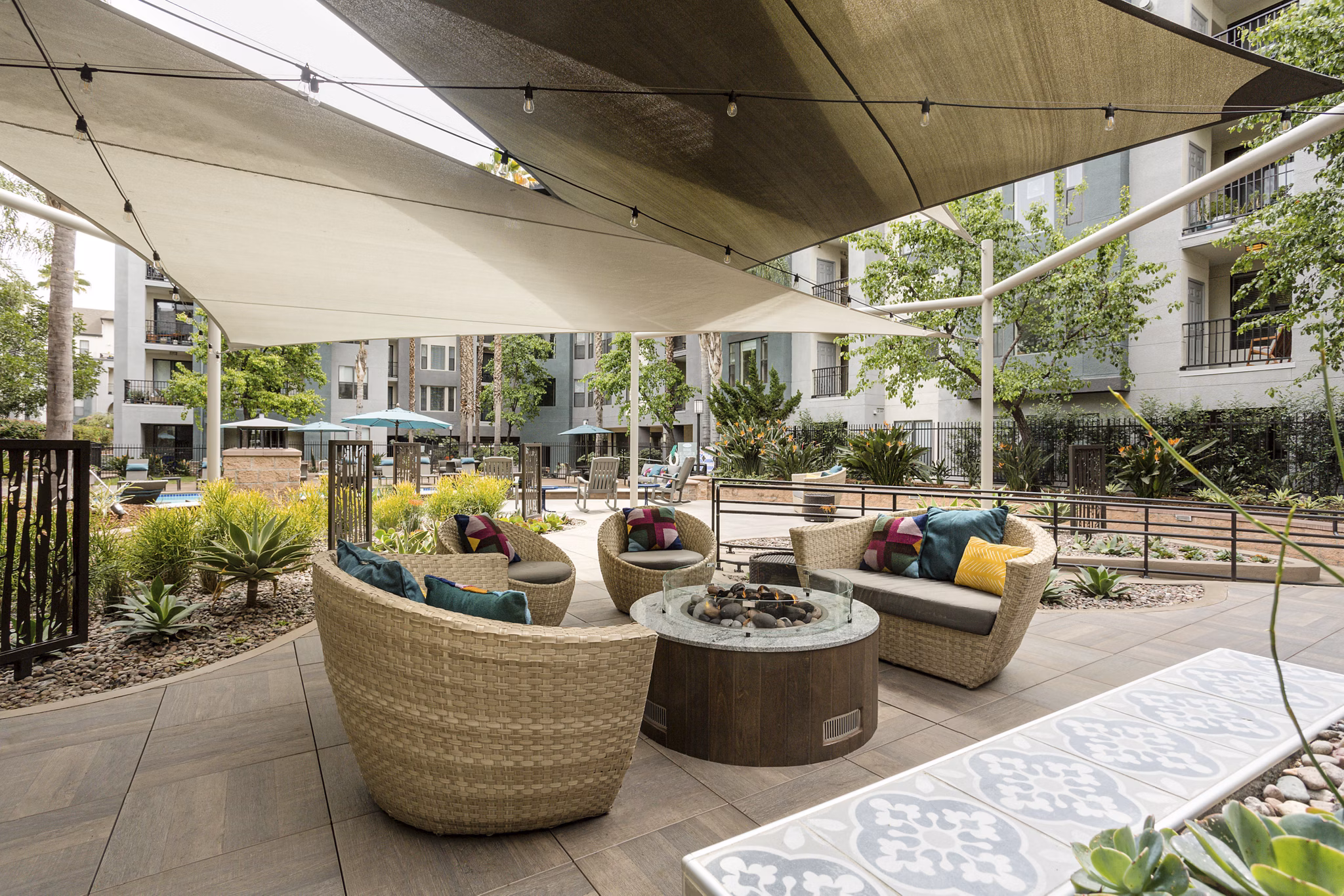 Serene courtyard with lush greenery at City Place Apartments, a Greystar luxury community