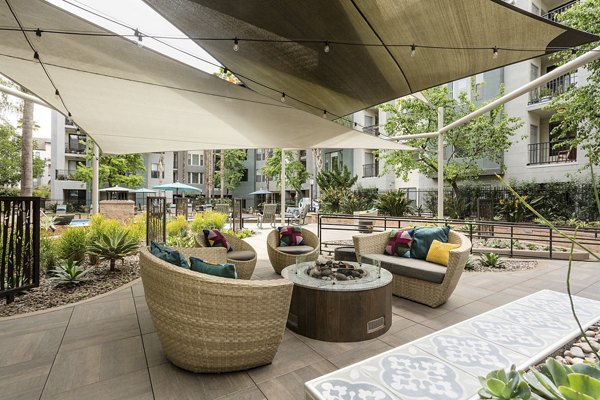 Serene courtyard with lush greenery at City Place Apartments, a Greystar luxury community