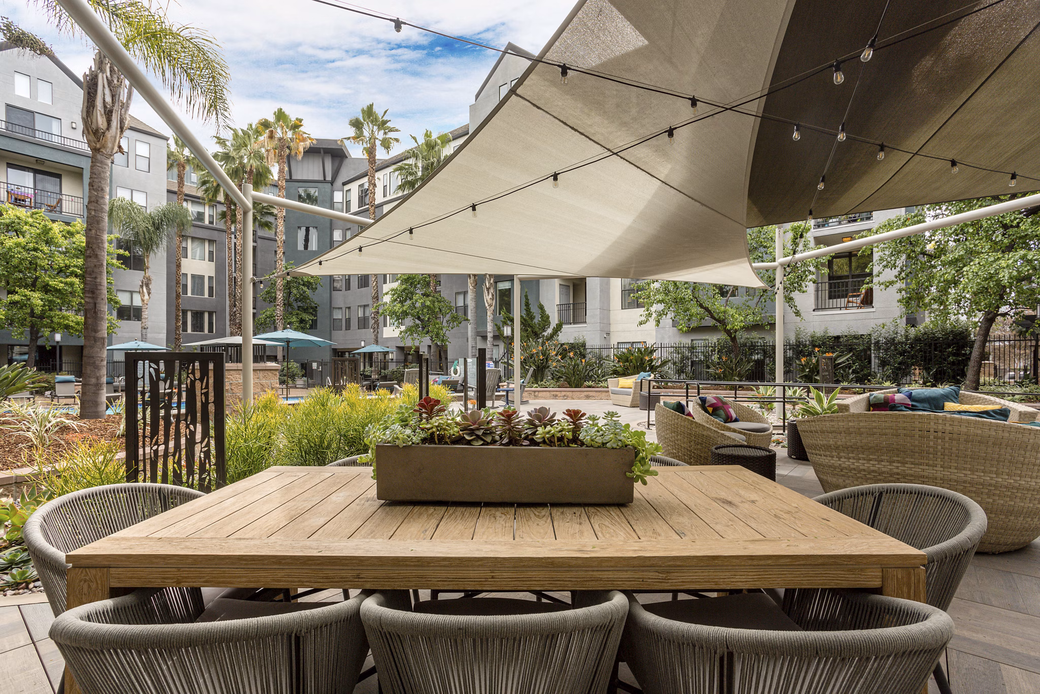 Courtyard with landscaped gardens at City Place Apartments with modern design elements