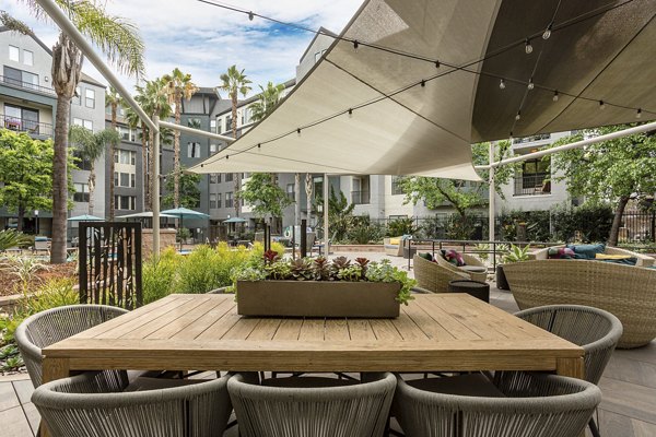 Courtyard with landscaped gardens at City Place Apartments with modern design elements