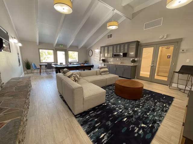 Modern clubhouse with elegant decor at Aspen Ridge Apartments, perfect for social gatherings and community events
