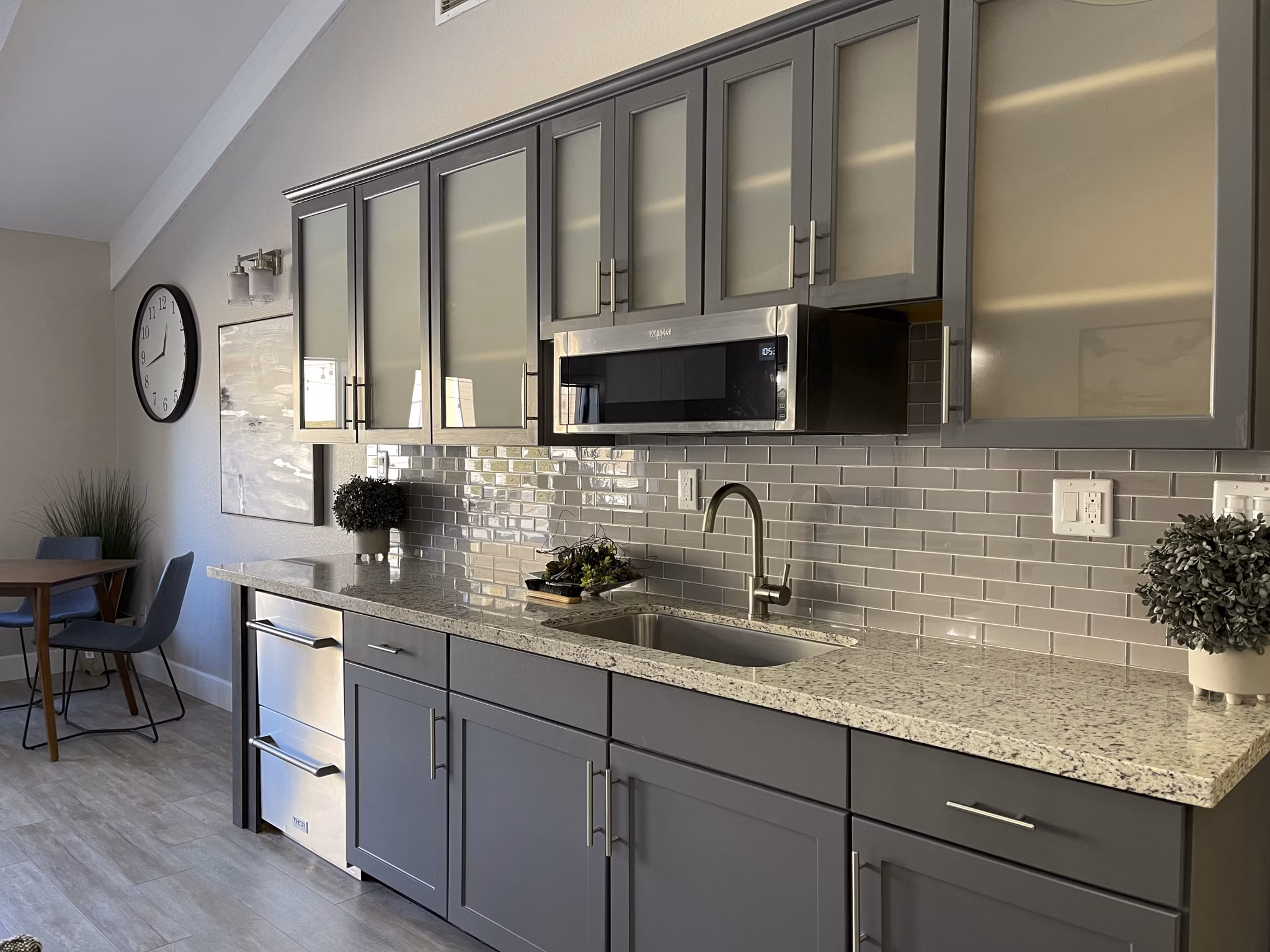 Modern clubhouse featuring stylish lounge and pool table at Aspen Ridge Apartments