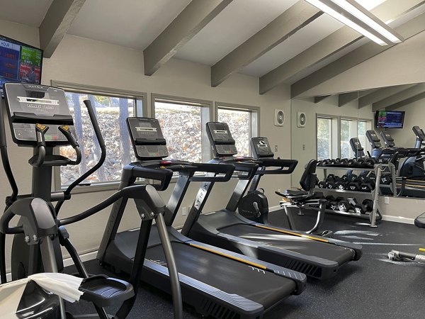 Aspen Ridge Apartments: Modern fitness center with state-of-the-art equipment, ideal for an active lifestyle in luxury living community