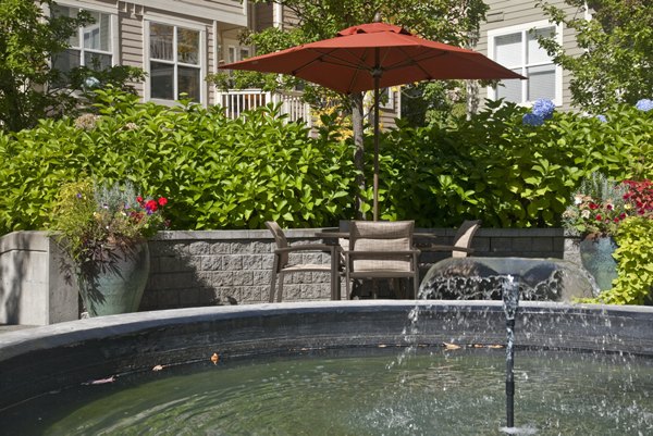 Recreational area with lounge seating and pool table at Lions Gate North Apartments