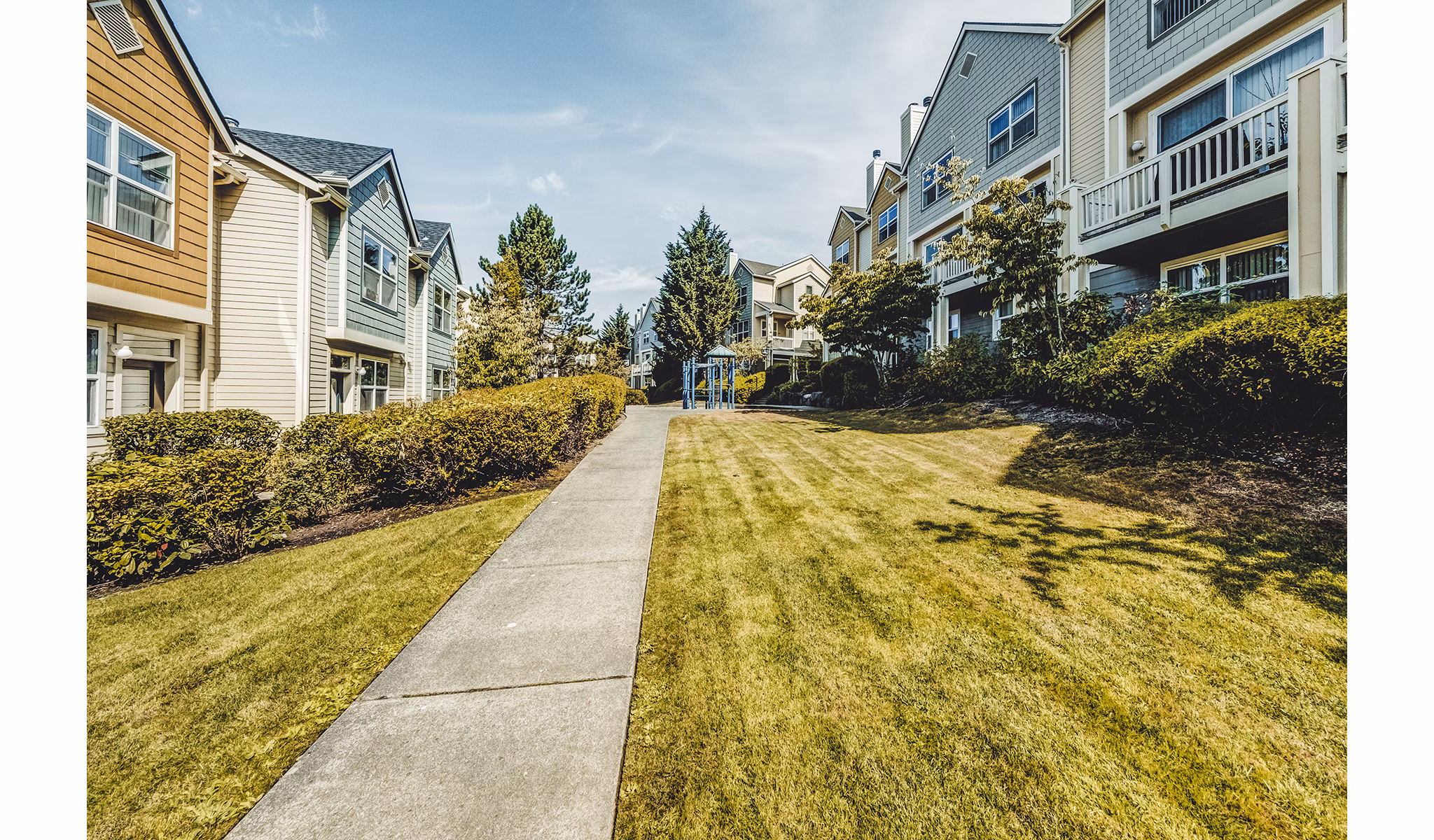 Bella Vista Apartments: Elegant courtyard with lush greenery and seating areas, perfect for relaxation and gatherings