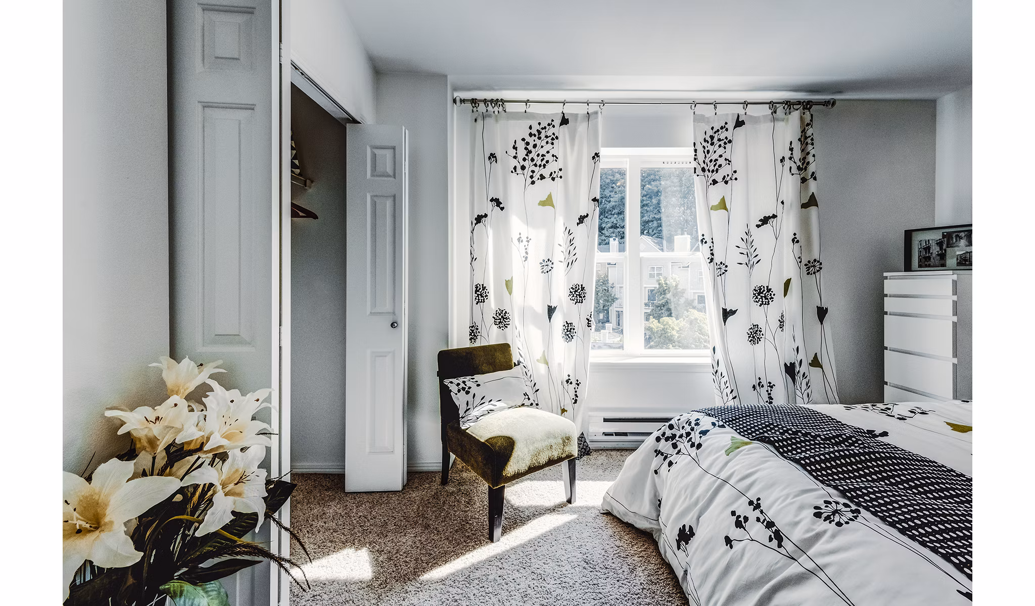 Spacious bedroom with modern decor in Bella Vista Apartments