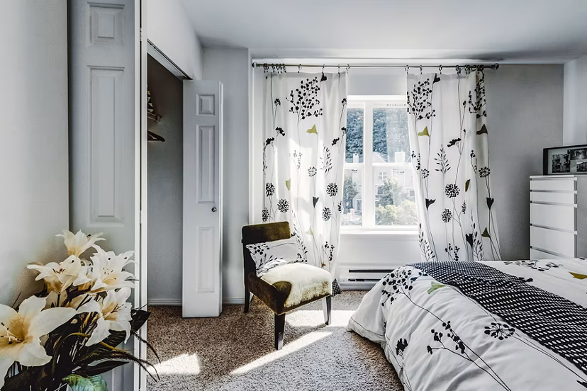 Spacious bedroom with modern decor in Bella Vista Apartments