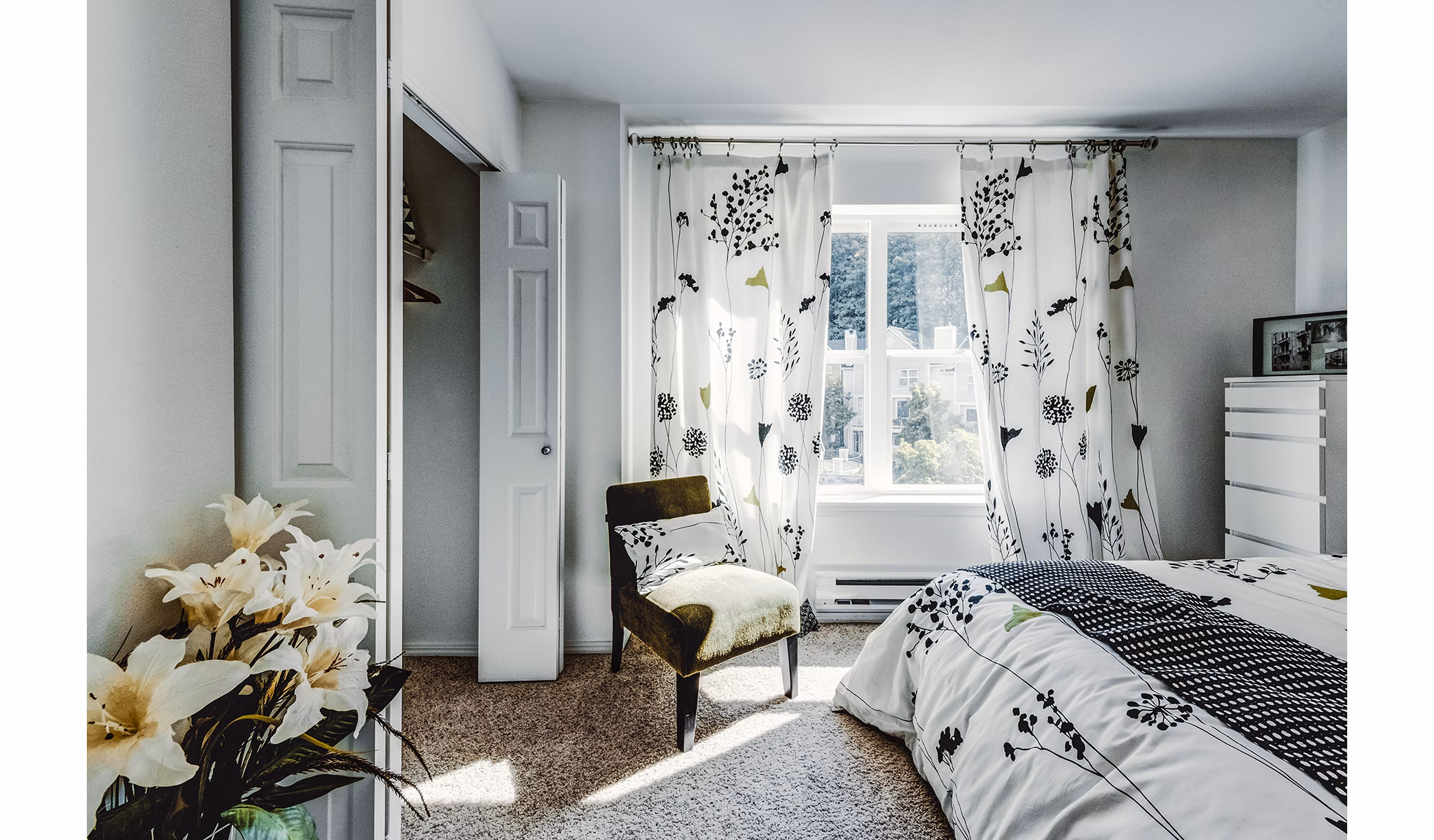 Spacious bedroom with modern decor in Bella Vista Apartments