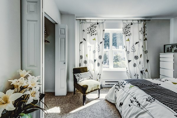 Spacious bedroom with modern decor in Bella Vista Apartments