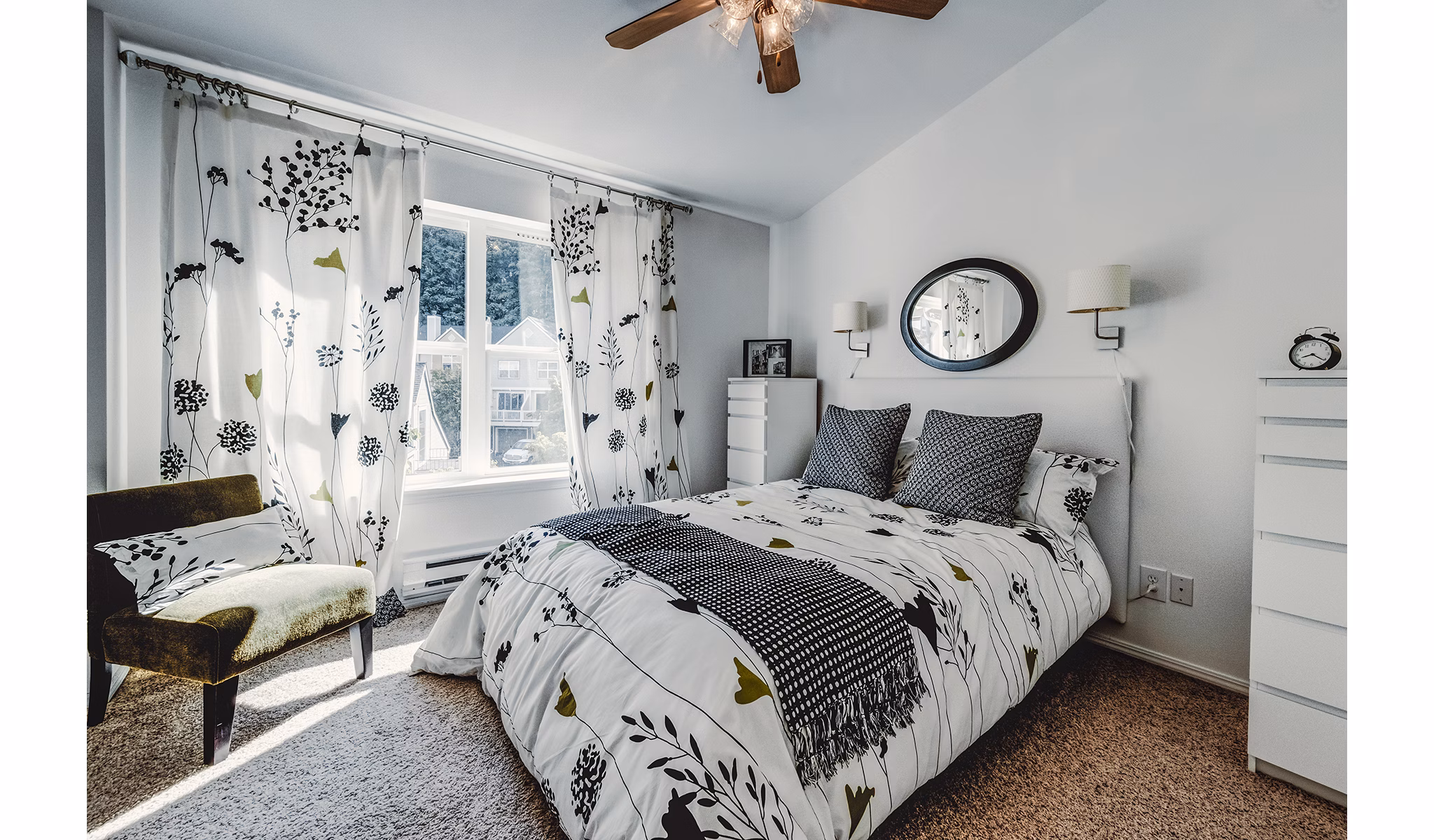 Cozy bedroom with modern decor in Bella Vista Apartments, offering luxury living at Greystar's high-end community