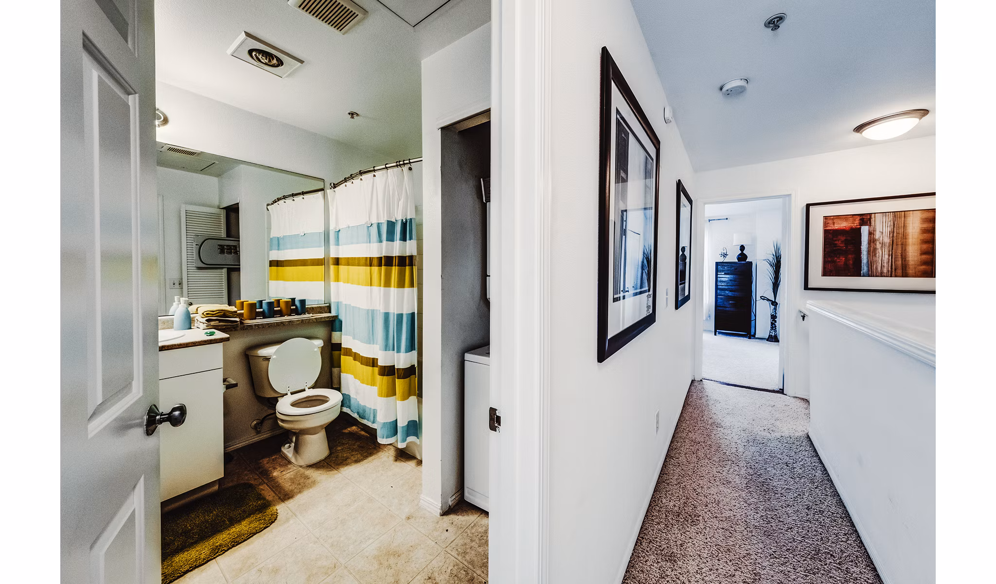 Bathroom featuring modern fixtures and elegant tilework at Bella Vista Apartments