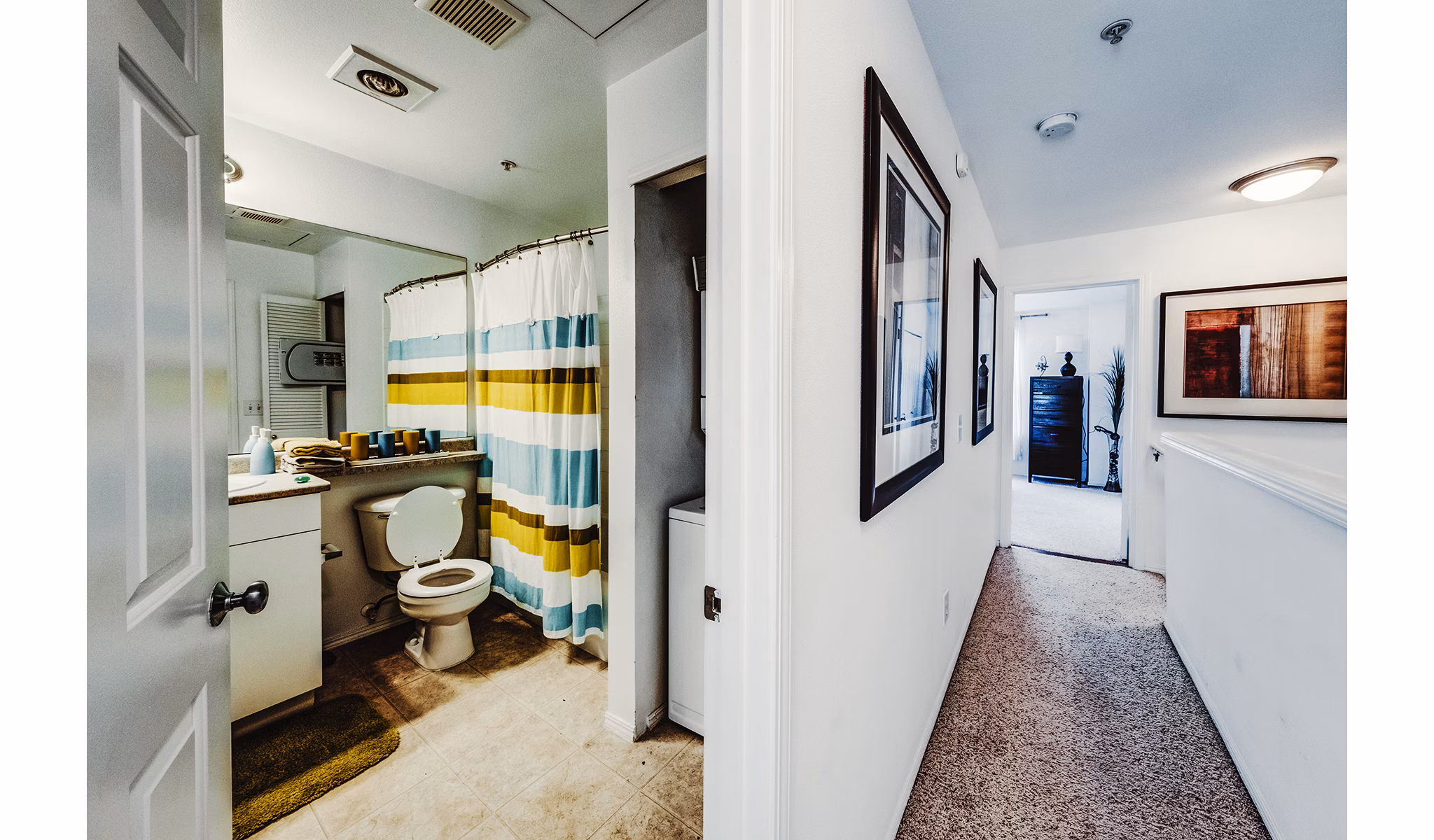 Bathroom featuring modern fixtures and elegant tilework at Bella Vista Apartments