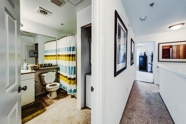 Bathroom featuring modern fixtures and elegant tilework at Bella Vista Apartments