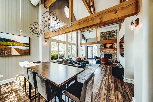 Elegant clubhouse and lobby at Bella Vista Apartments featuring modern decor and comfortable seating for residents and guests