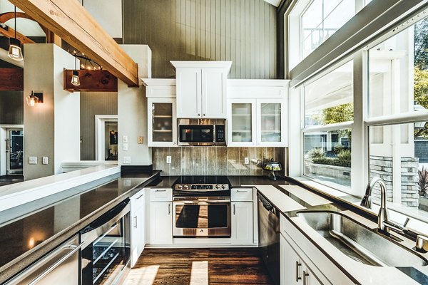 Modern clubhouse kitchen with stainless steel appliances at Bella Vista Apartments, offering luxury living amenities