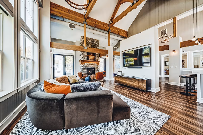 Bella Vista Apartments: Elegant clubhouse lobby with stylish seating and modern decor