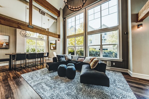 Clubhouse lobby with modern decor and seating area at Bella Vista Apartments, Greystar luxury living location