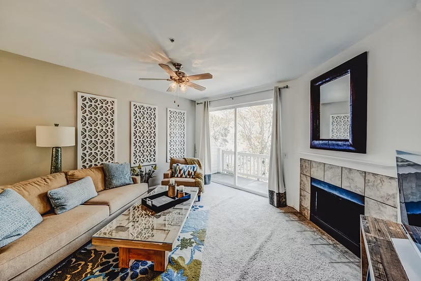Spacious living room with modern decor at Bella Vista Apartments