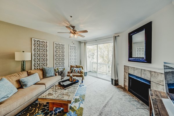 Spacious living room with modern decor at Bella Vista Apartments