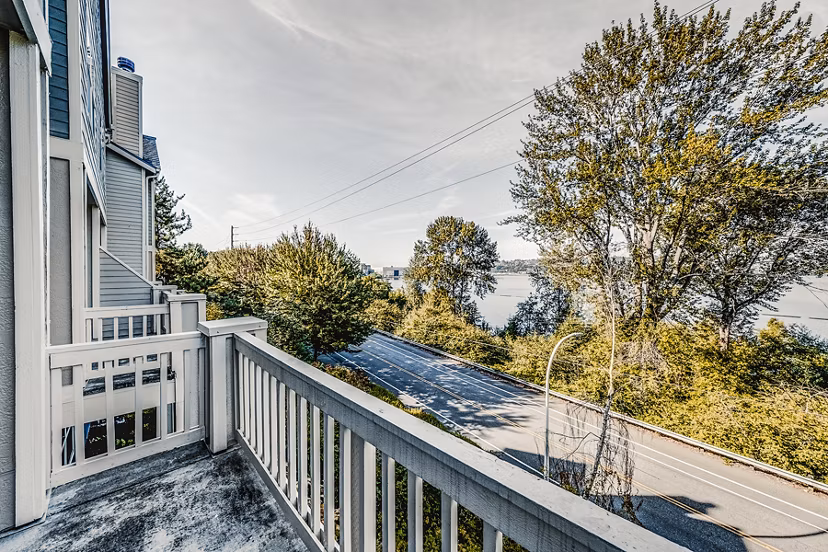 Bella Vista Apartments: Cozy patio with stylish seating and lush landscaping, perfect for relaxation and outdoor gatherings