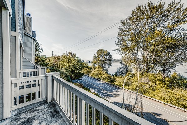 Bella Vista Apartments: Cozy patio with stylish seating and lush landscaping, perfect for relaxation and outdoor gatherings