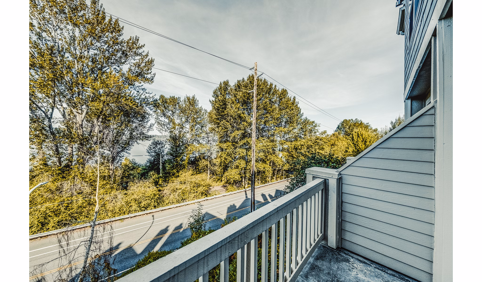 Bella Vista Apartments: Cozy patio area with scenic views, ideal for relaxing outdoors in a luxury setting