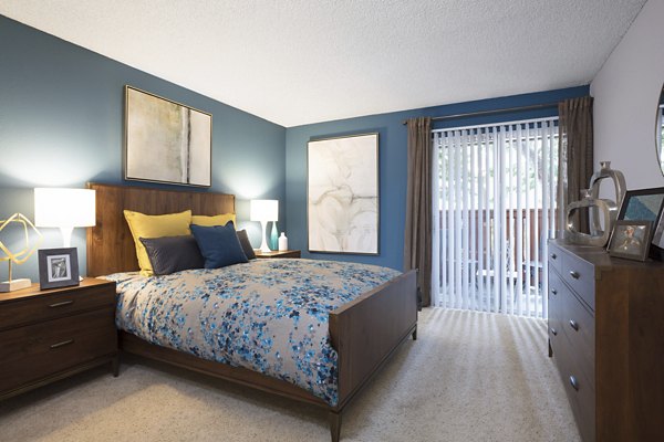 Modern bedroom with elegant decor at La Terraza Apartments