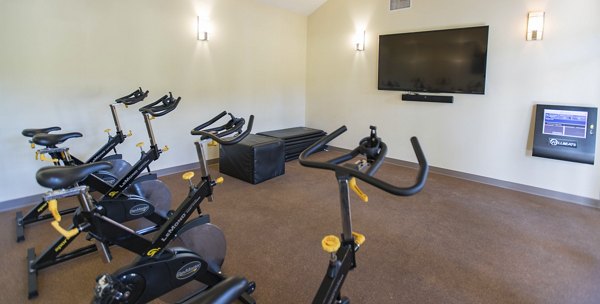 Yoga/spin studio with high-end equipment at Axiom La Jolla Apartments for fitness enthusiasts