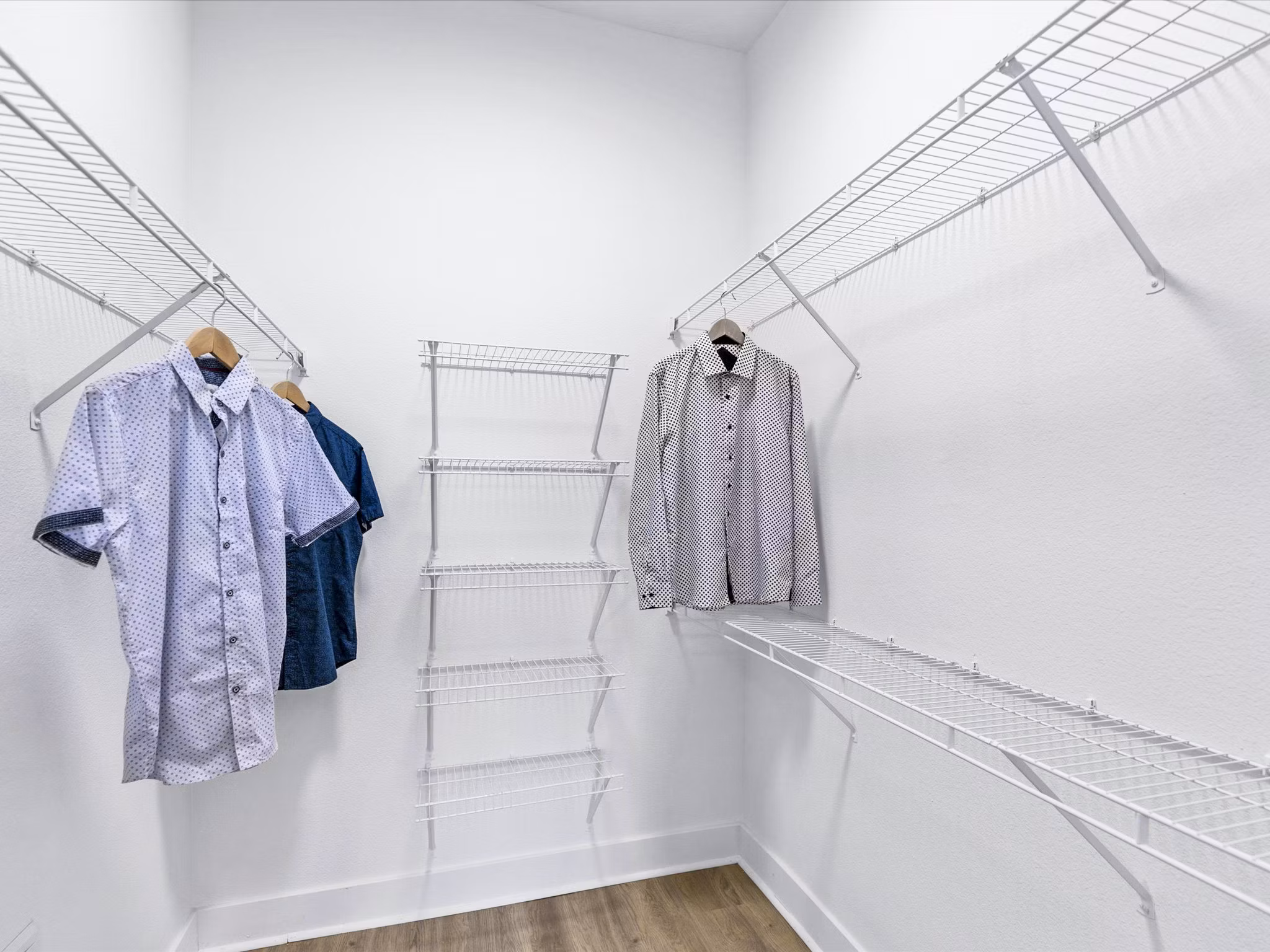 Spacious bedroom closet with built-in storage at Ambrose Apartments
