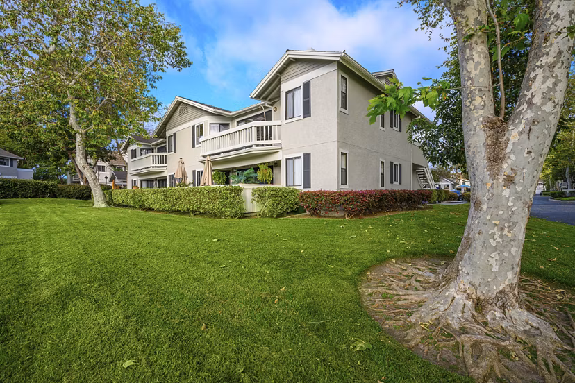 Flower Fields Apartments: Lush landscaped grounds and elegant architecture in a luxury complex
