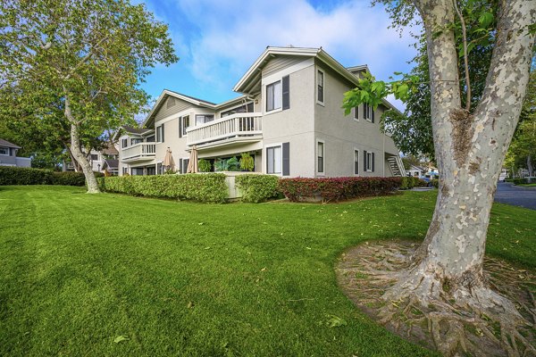 Flower Fields Apartments: Lush landscaped grounds and elegant architecture in a luxury complex
