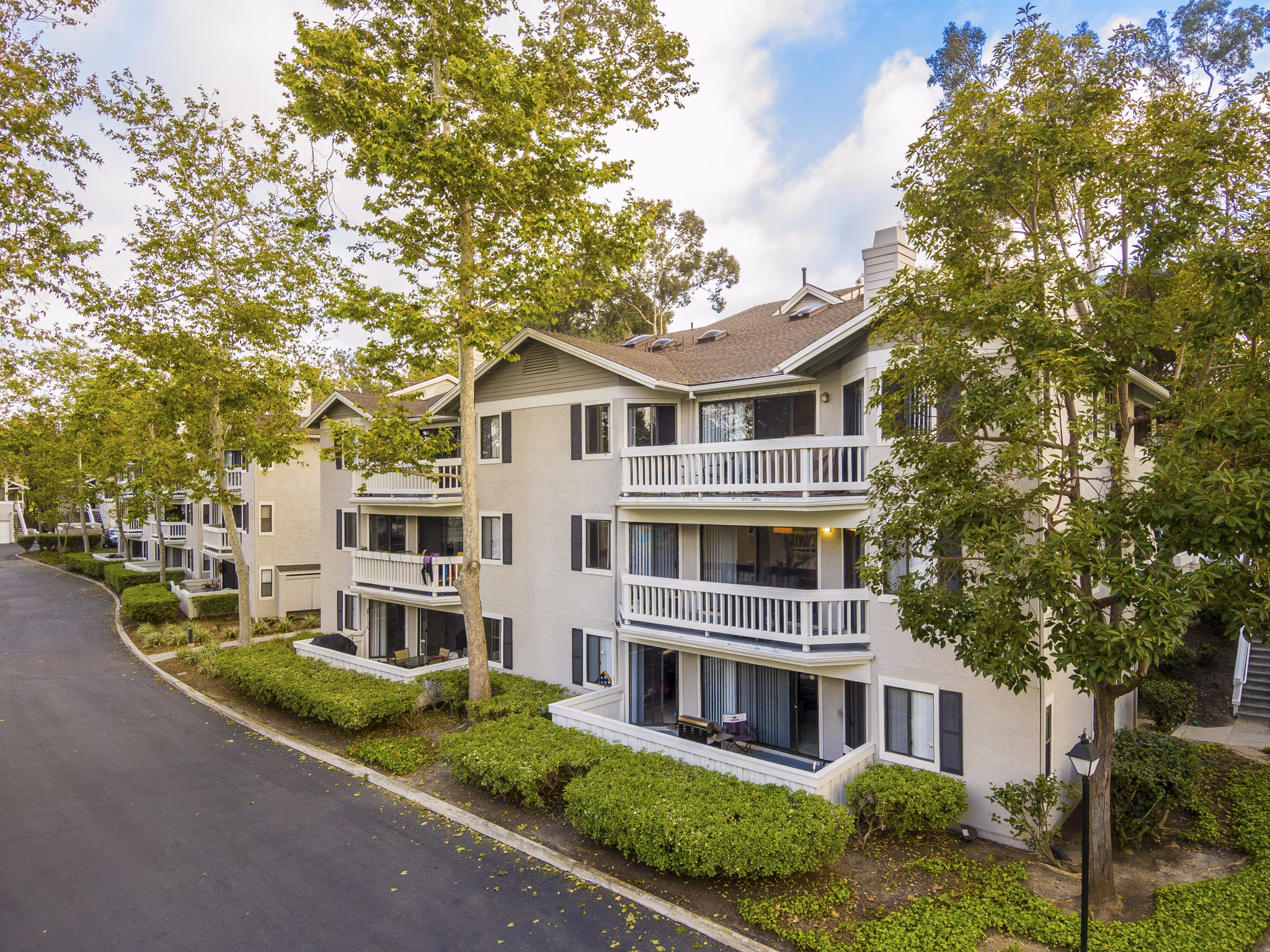 Flower Fields Apartments: Elegant design with lush landscaping in a prime location