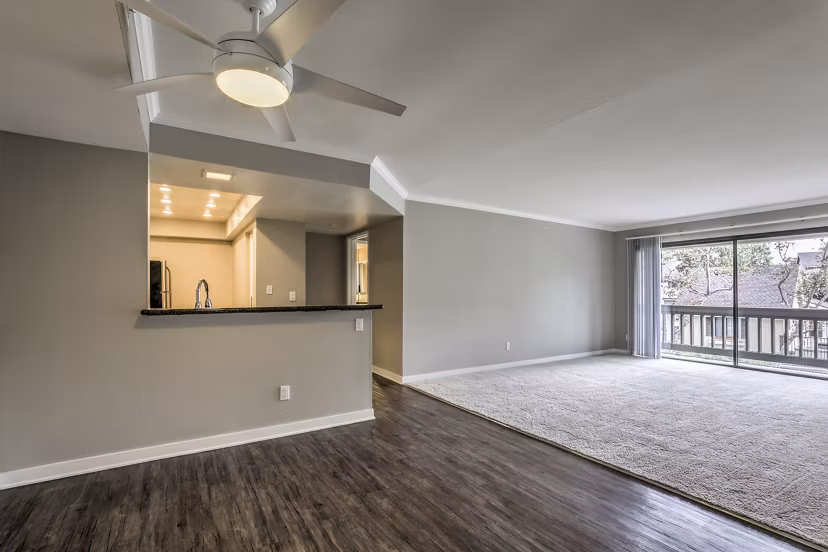 Flower Fields Apartments: Stylish living room with modern furniture and vibrant decor, perfect for luxury living