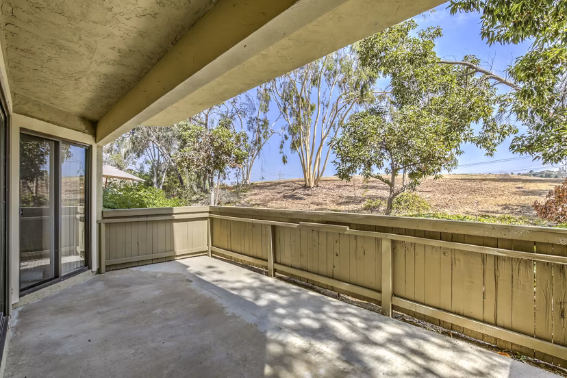 Patio with outdoor seating at Flower Fields Apartments, a Greystar community