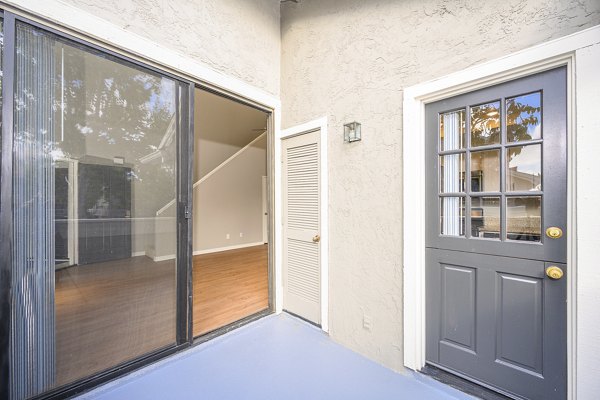Private patio with scenic views at Flower Fields Apartments
