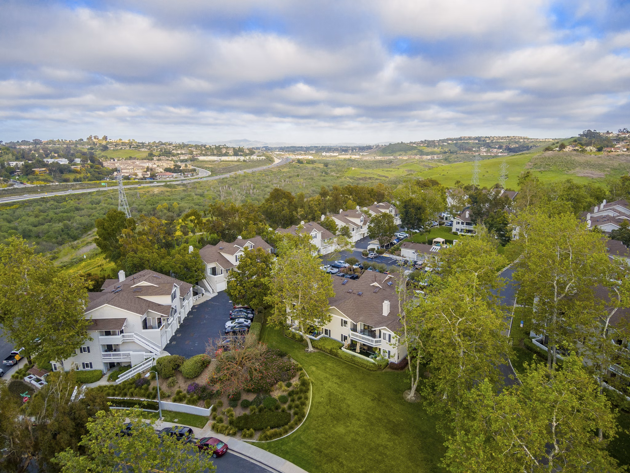 Flower Fields Apartments: Scenic view of luxury apartments surrounded by vibrant flower gardens