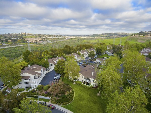 Flower Fields Apartments: Scenic view of luxury apartments surrounded by vibrant flower gardens