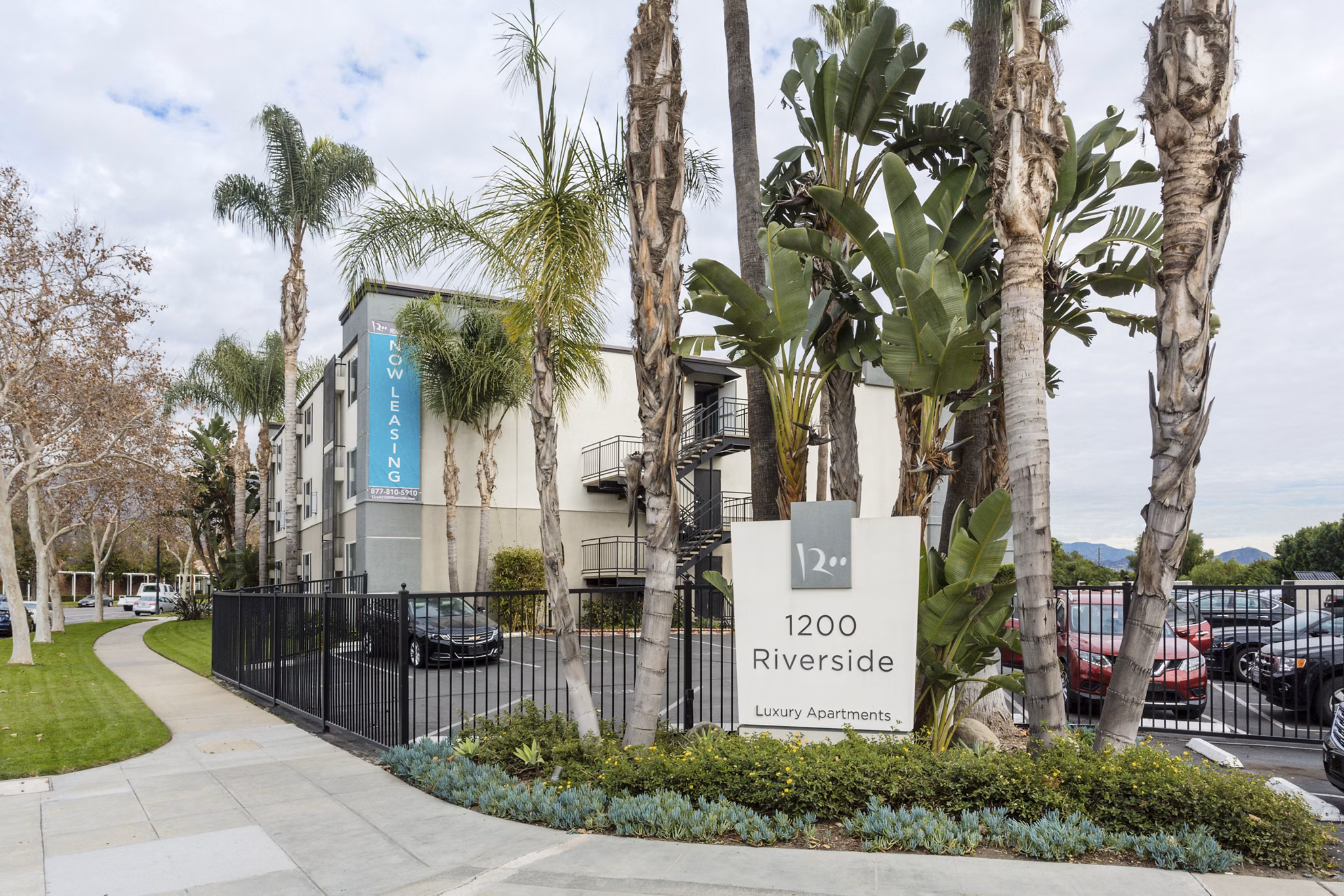 1200 Riverside Apartments: Modern signage outside luxury apartments in prime riverside location