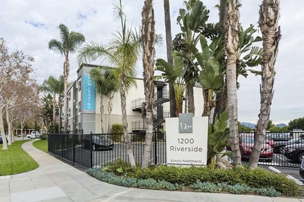 1200 Riverside Apartments: Modern signage outside luxury apartments in prime riverside location