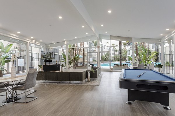 Clubhouse interior with stylish seating and modern decor at 1200 Riverside Apartments