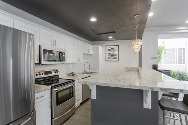 Clubhouse featuring modern design elements at 1200 Riverside Apartments