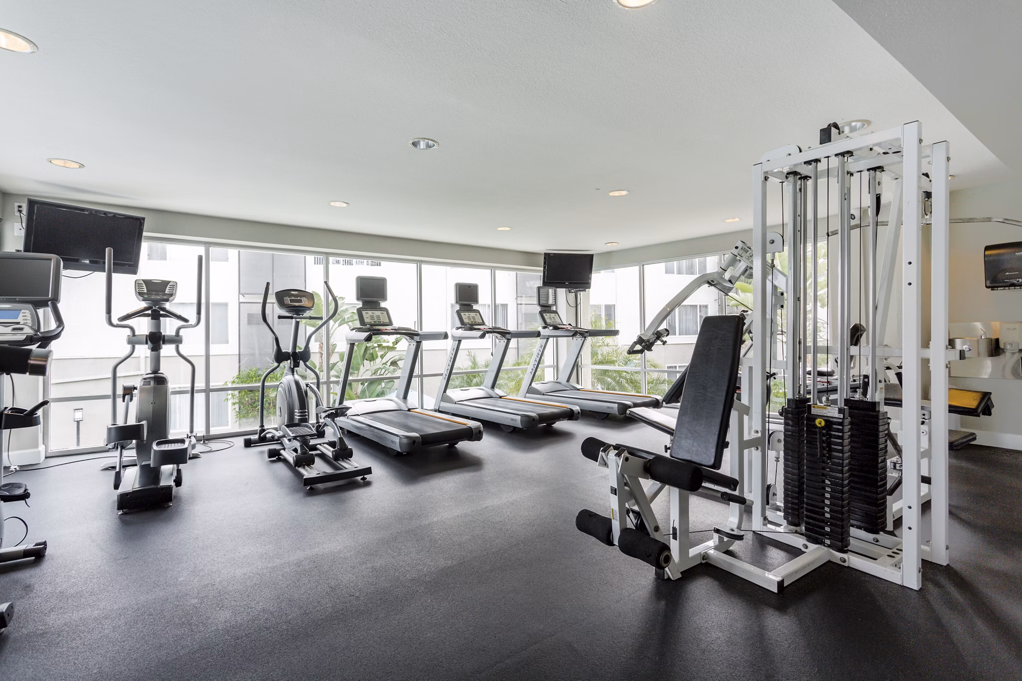 Modern fitness center with state-of-the-art equipment at 1200 Riverside Apartments