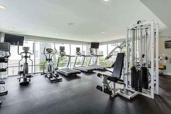 Modern fitness center with state-of-the-art equipment at 1200 Riverside Apartments