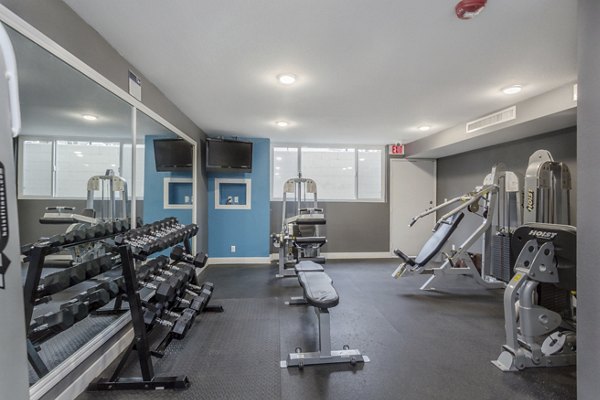 State-of-the-art fitness center equipped with modern gym facilities at 1200 Riverside Apartments