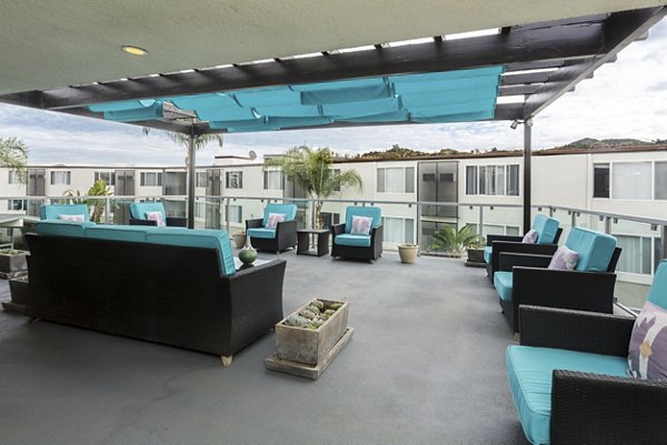 Rooftop deck with city skyline views at 1200 Riverside Apartments