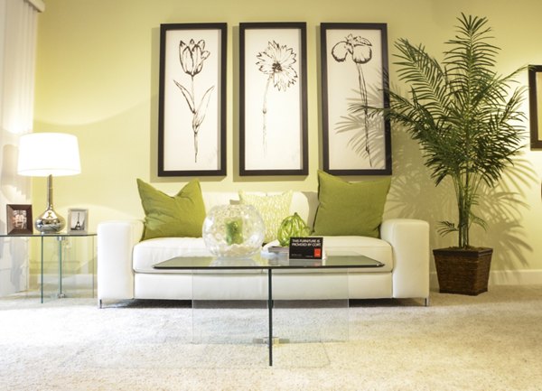 Spacious living room with modern decor at The Windsor Apartments, featuring luxury seating and ample natural light