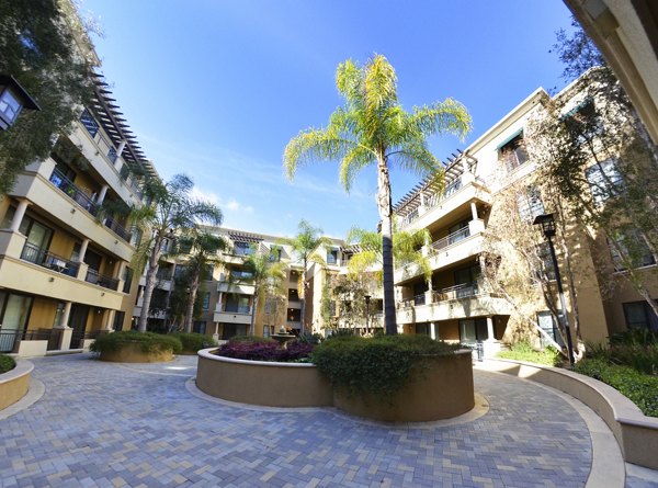 Patio with modern seating at The Windsor Apartments suitable for social gatherings